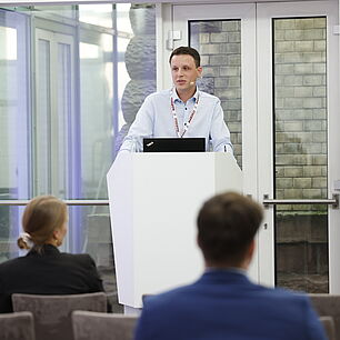 EPTS - Speaker on Stage in Session Room