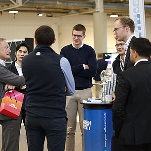 EPTS - Participants in the exhibition area chatting