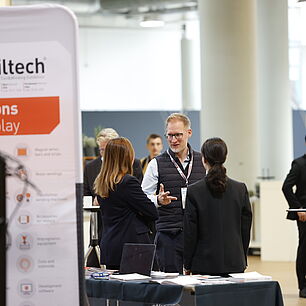 EPTS - Participants in the exhibition area chatting