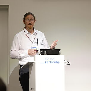 EPTS - Speaker on Stage in Session Room
